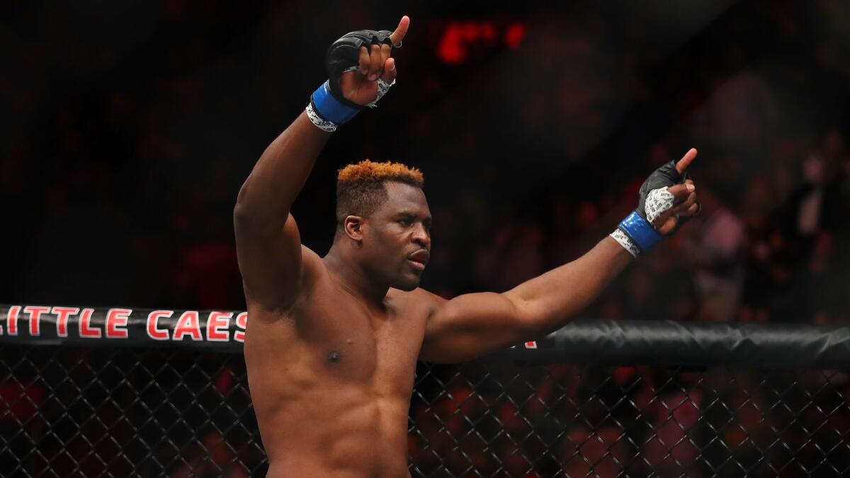 Francis Ngannou celebrates his victory over Alistair Overeem.