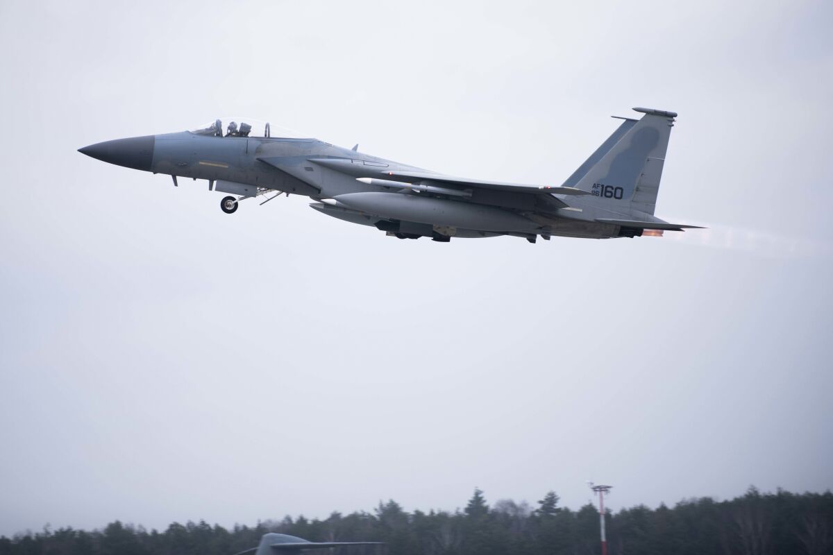 In this image provided by the U.S. Air Force, a U.S. Air Force F-15C Eagle assigned to the 493rd Fighter Squadron, Royal Air Force (RAF) Lakenheath, takes off in support of North Atlantic Treaty Organization enhanced air policing missions with the Polish Air Force at Lask Air Base, Poland, Feb. 15, 2022. Russia's attack on Ukraine's Zaporizhzhia nuclear power plant has renewed calls for NATO to impose a no-fly zone over Ukraine, despite the repeated rejection of the idea by western leaders concerned about triggering a wider war in Europe. (Tech. Sgt. Jacob Albers/U.S. Air Force via AP)