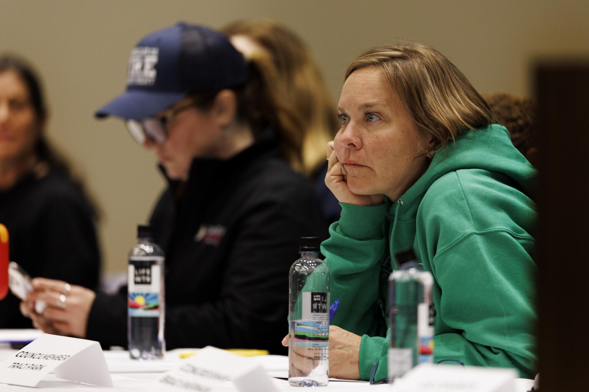 L.A. City Councilmember Traci Park listens during a town hall on debris removal.