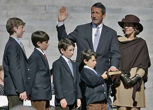 Mark Sanford, with his wife, Jenny, and their four sons, takes the oath of office in January 2007 after his reelection as South Carolina governor. Their divorce followed his admission in 2009 of an affair with an Argentine woman.