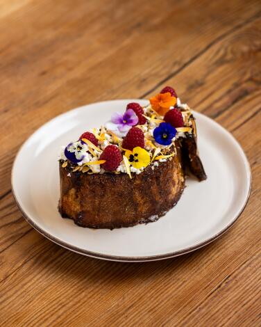 San Diego, CA, May 23 - Torrija - Spanish french toast Thick-cut sourdough, raspberry, nutty superfood, granola, chevre, raspberry balsamic at Atelier Manna, Friday, May 23, 2025 in San Diego, CA. (Deanna Sandoval / For The Times)