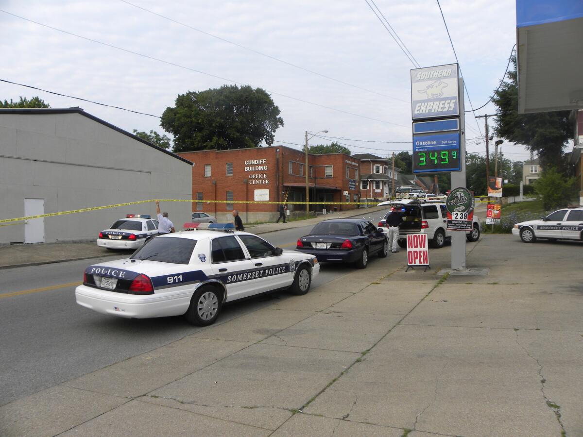Somerset Police respond to the scene of a shooting Friday morning. Somerset police say Mark Stanziano, 57, was shot and killed outside of his law office.