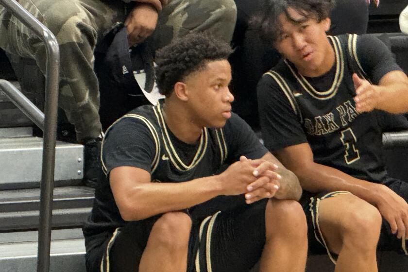 Seshsha Henderson of Oak Park takes a breather. He made eight threes and scored 31 points in loss to Heritage Christian.