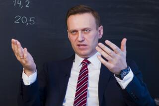 FILE - Russian opposition politician Alexei Navalny gestures while speaking during his interview to the Associated Press in Moscow, Russia on Dec. 18, 2017. U.S. intelligence officials have determined that Russian President Vladimir Putin likely didn't order the death of Navalny, the imprisoned opposition leader, in February of 2024. An official says the U.S. intelligence community has found "no smoking gun" that Putin was aware of the timing of Navalny's death or directly ordered it. (AP Photo/Alexander Zemlianichenko, File)