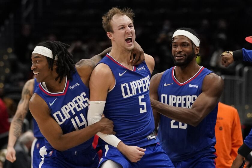 Los Angeles Clippers guard Luke Kennard (5) celebrates after hitting the game tying shot.