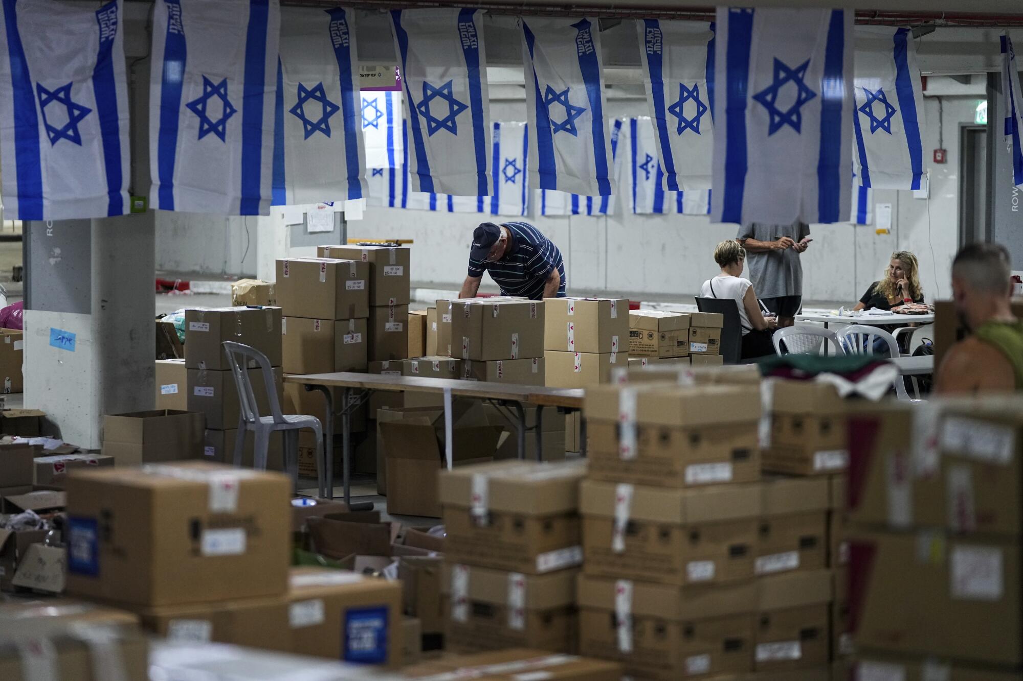 Volunteers working at an aid center to support Israeli soldiers