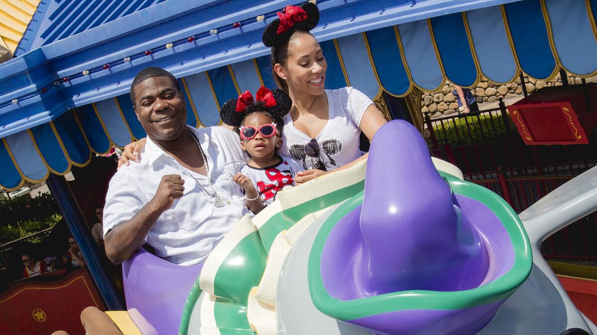 Tracy Morgan, his fiancée, Megan Wollover, and their daughter Maven Morgan ride on Dumbo the Flying Elephant at the Magic Kingdom theme park in Florida on June 2. The occasion? Maven's second birthday.