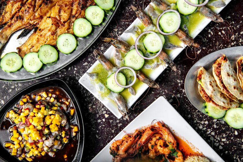 INGLEWOOD , CA - AUGUST 25: clockwise from top left: Pescado Zarandeado, aguachile verde, marlin tacos, camarones borrachos, and marinero ceviche from 106 Seafood Underground on Thursday, Aug. 25, 2022 in Inglewood , CA. (Mariah Tauger / Los Angeles Times)