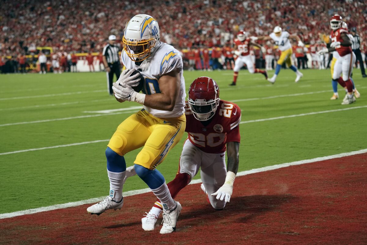 Chargers fullback Zander Horvath catches a touchdown pass in front of Kansas City Chiefs safety Justin Reid.