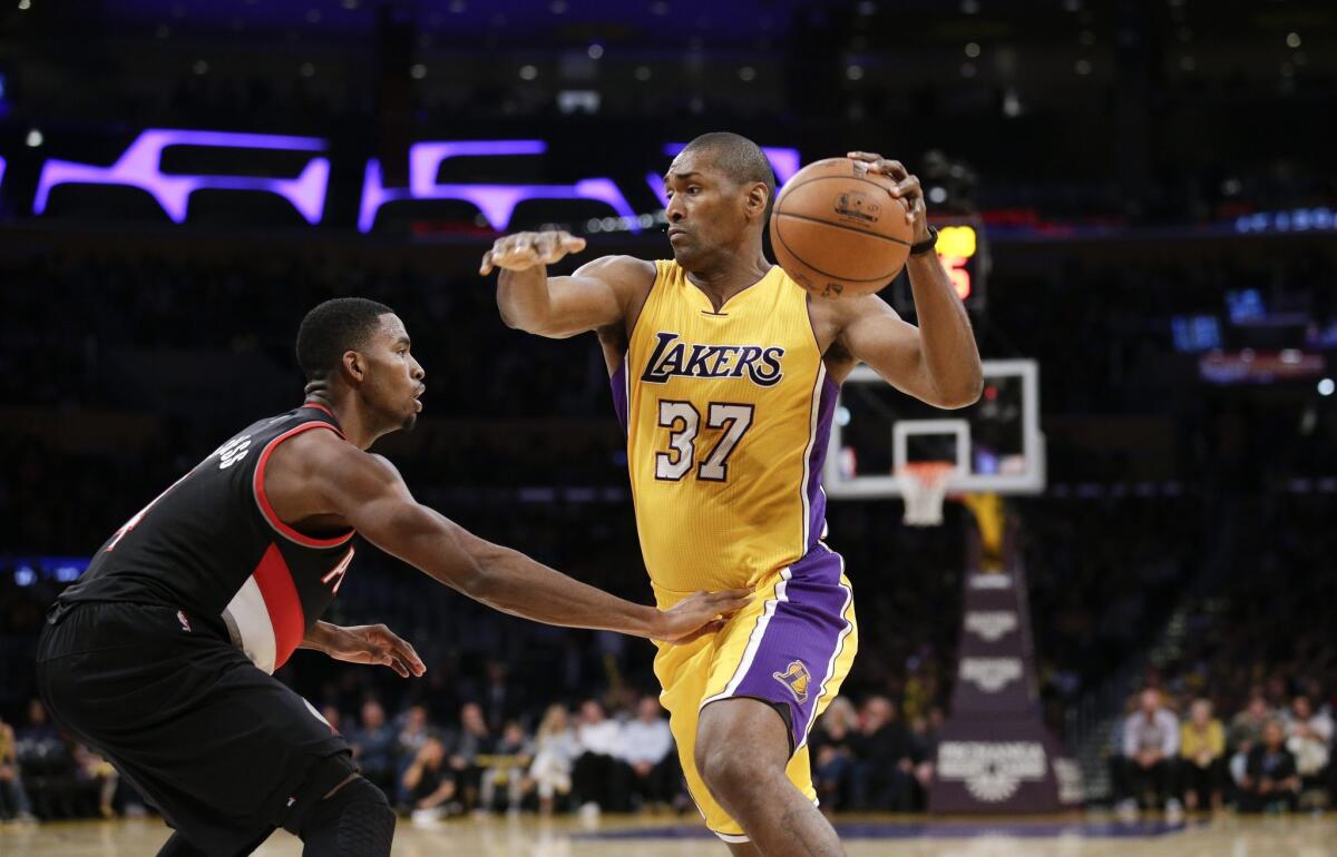The Lakers' Metta World Peace plays against the Portland Trail Blazers at Staples Center on Oct. 19.