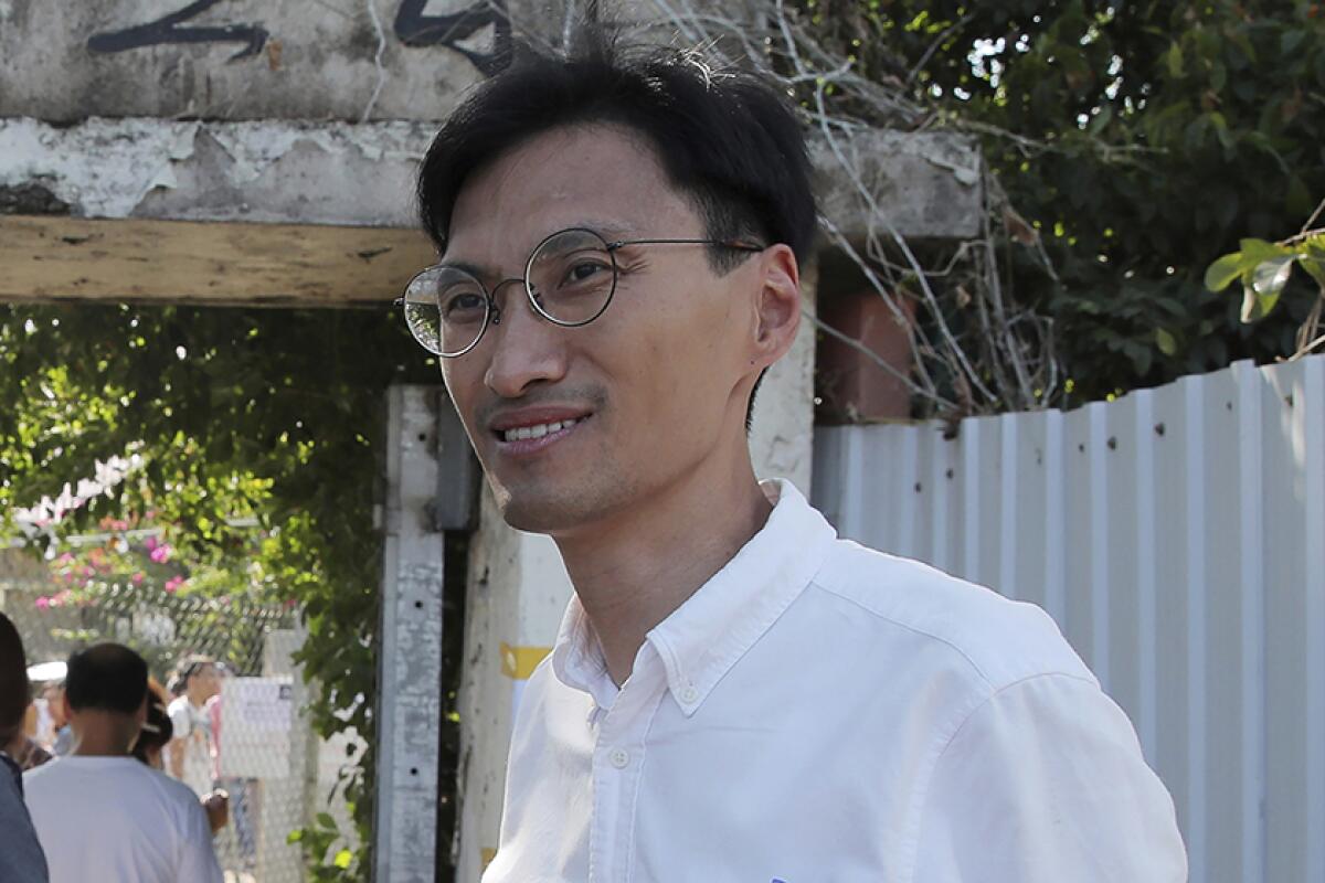 Former Hong Kong lawmaker Eddie Chu was among those arrested Sunday.