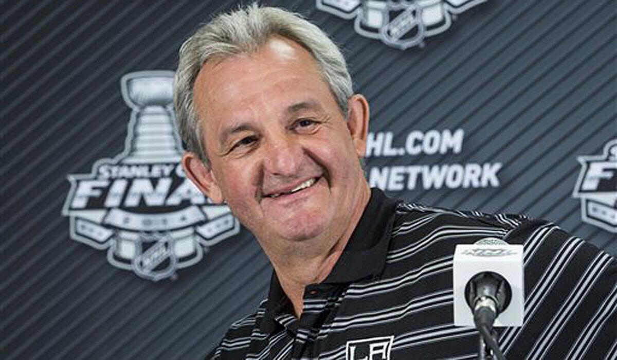 Darryl Sutter coached the Kings to Stanley Cup titles in 2012 and 2014.