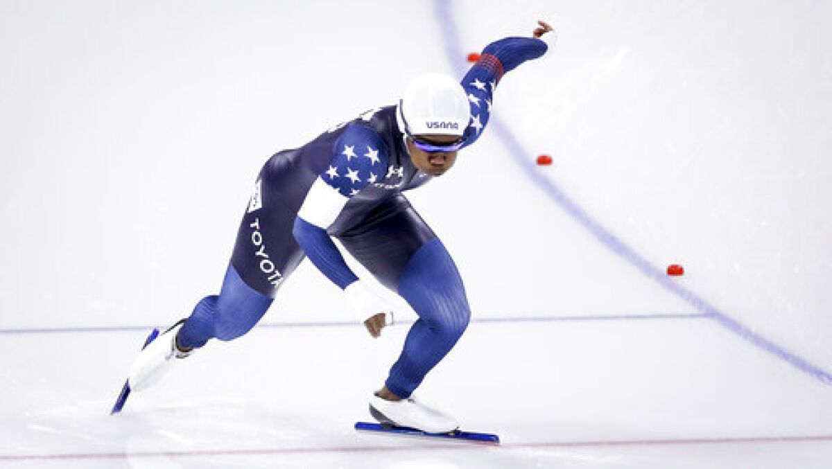 Erin Jackson, of the United States, skates during the women's 500-meter competition at the ISU World Cup speed skating event in Calgary, Alberta, Saturday, Dec. 11, 2021. (Jeff McIntosh/The Canadian Press via AP)