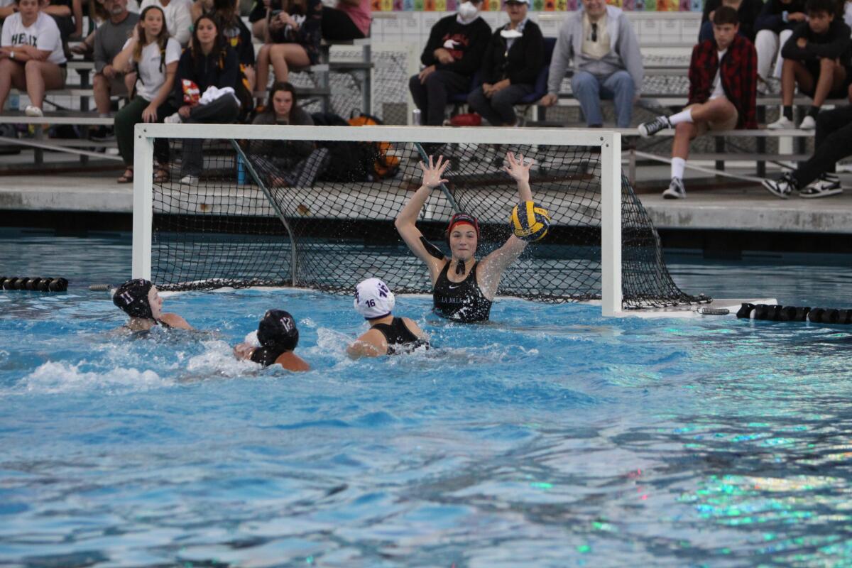 La Jolla High School goalie Roxy Hazuka guards the net against Carlsbad.