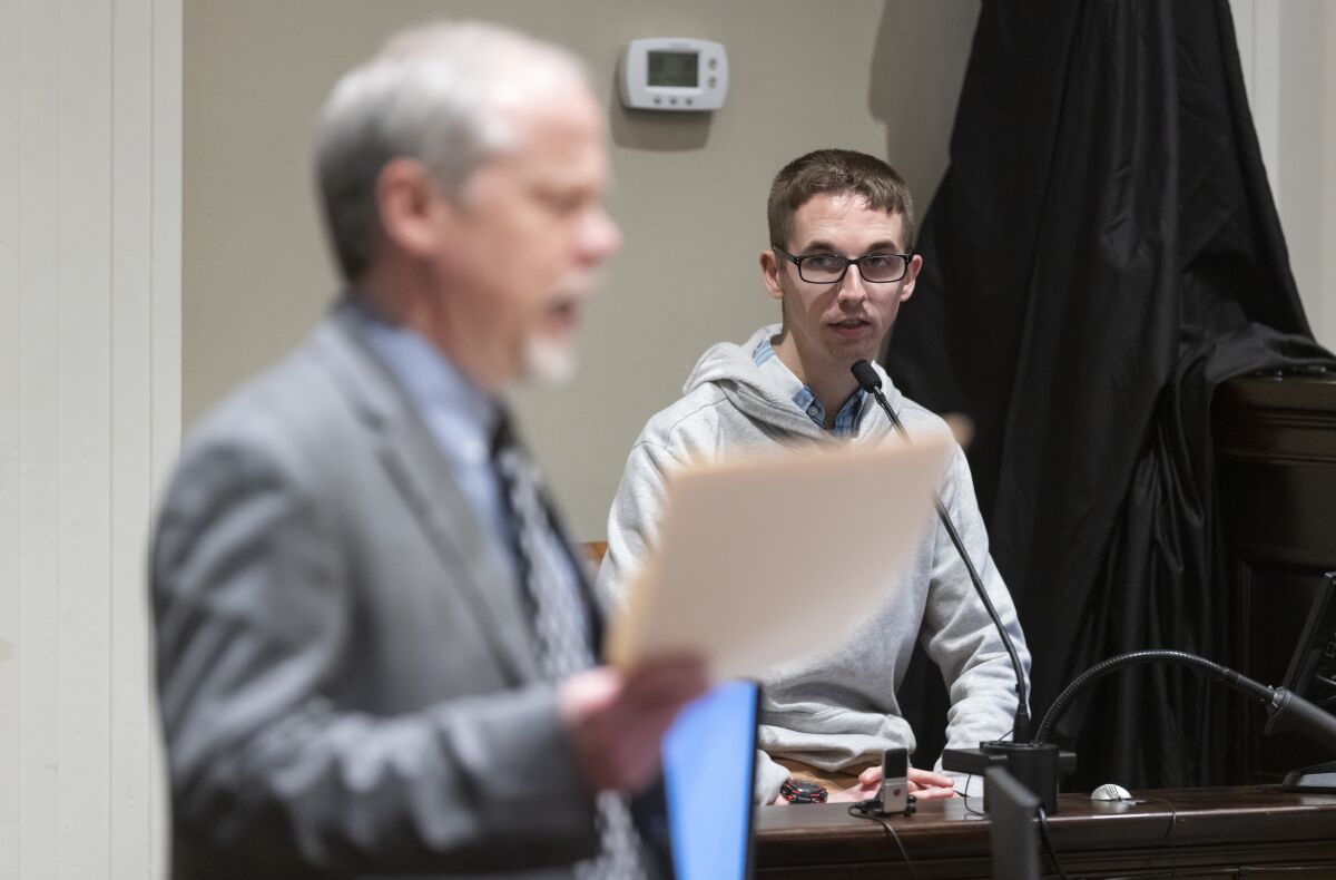 Michael "Tony" Satterfield, son of Gloria Satterfield, right, answers questions by prosecutor Creighton Waters during Alex Murdaugh's double murder trial at the Colleton County Courthouse in Walterboro, S.C., Friday, Feb. 3, 2023. The 54-year-old attorney is standing trial on two counts of murder in the shootings of his wife and son at their Colleton County home and hunting lodge on June 7, 2021. (Sam Wolfe/The State, Pool)