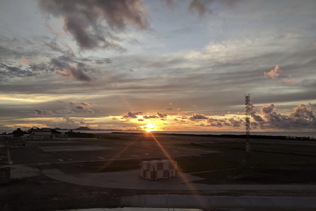 A sunset at a Micronesian airport.