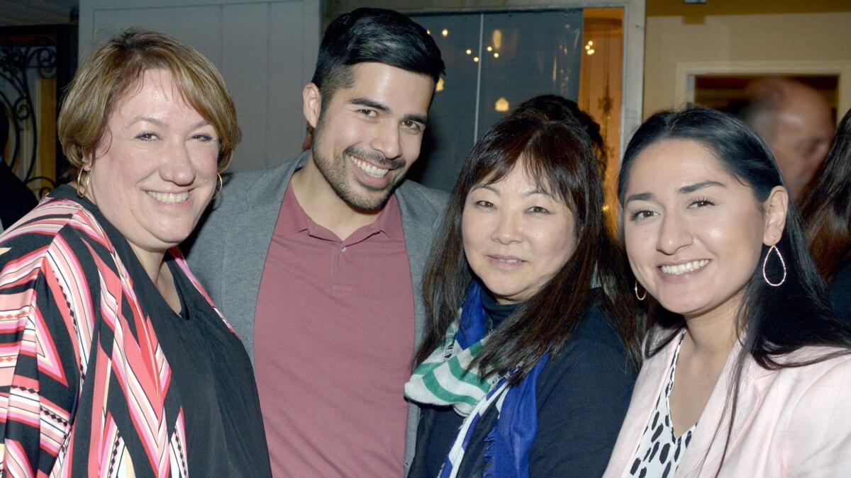 Raising funds to complete capital improvements for the Kids' Community Dental Clinic are Christine Rumfola, from left, Gerrard Panahon, Dale Gorman and Emily Lopez.