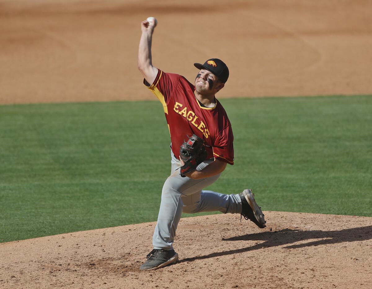 Estancia pitcher Trevor Scott throws a pitch during the Halo Classic game against Costa Mesa on March 21. 