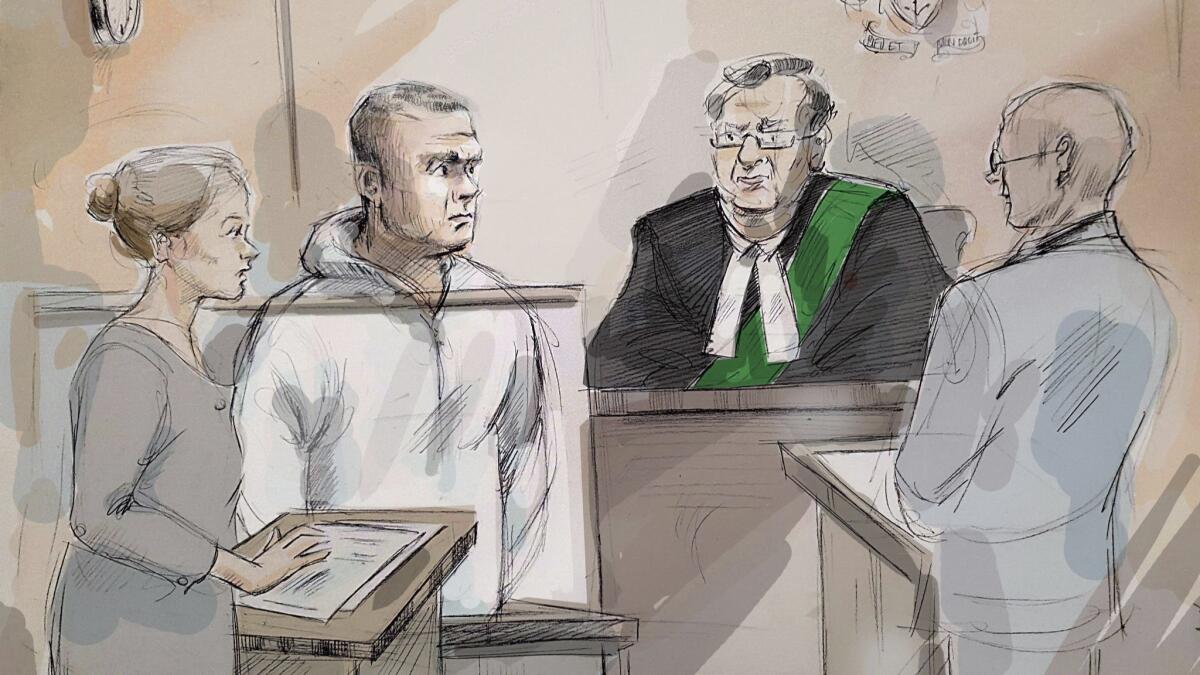 In this courtroom sketch, Alek Minassian, second from left, appears before Justice of the Peace Stephen Waisberg in Toronto on Tuesday.