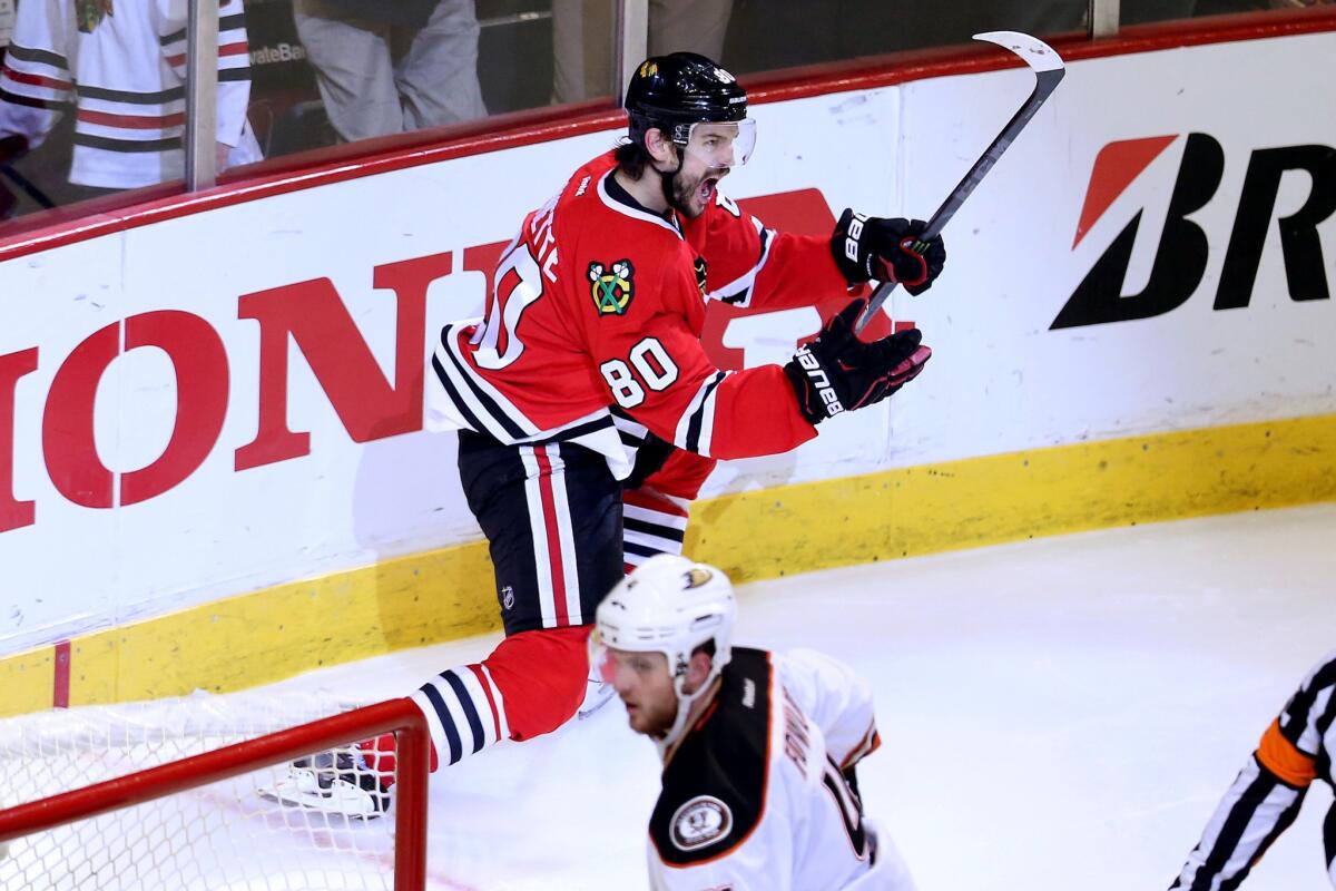 Chicago forward Antoine Vermette celebrates after scoring the game-winning goal in double overtime to give the Blackhawks a 5-4 win.