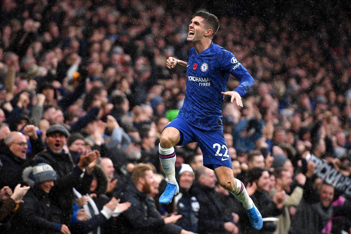 Chelsea's Christian Pulisic celebrates after scoring against Crystal Palace during a Premier League match Nov. 9 at Stamford Bridge. 