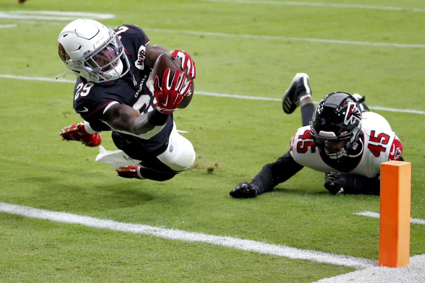 Cardinals beat Falcons 34-33 after Bryant's extra point miss - The