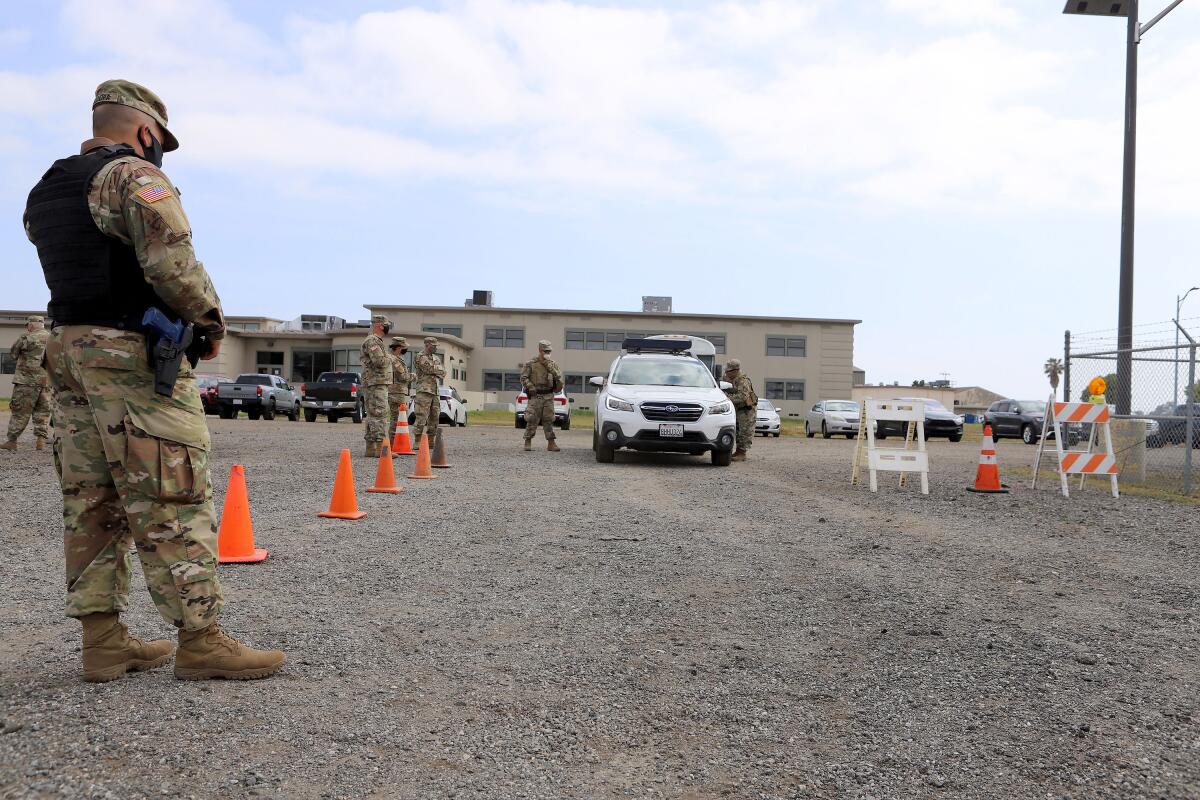 The California State Guard's Emergency Response Command practices operating a traffic control post.