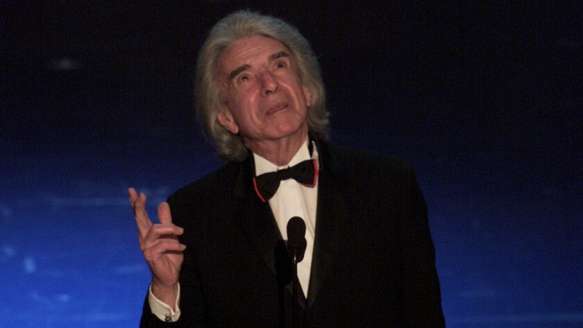 Arthur Hiller, former president of the Academy of Motion Picture Arts and Sciences, speaks after accepting the Jean Hersholt Humanitarian Award during the 74th Academy Awards in 2002.