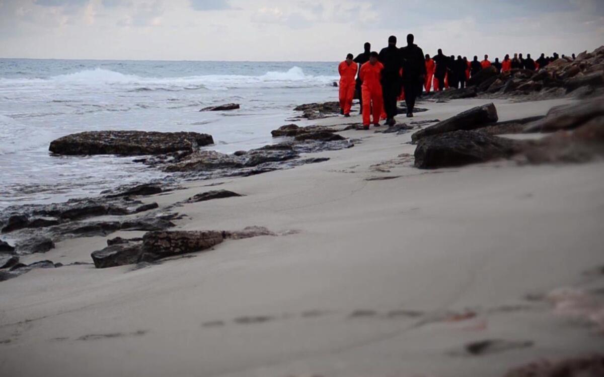 Coptic Christians from Egypt are led to their deaths by black-costumed Islamic State captors in one of the group's increasingly sophisticated videos.