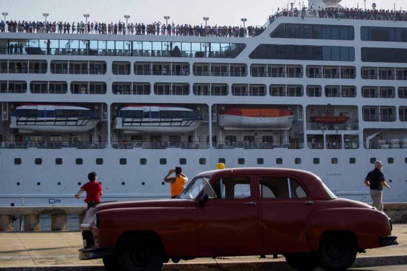FILE - This May 2, 2016, file photo, shows the Adonia cruise ship arriving in Havana, Cuba, from Miami. Cruise ship operator Carnival is citing the U.S. ban on cruises to Cuba among factors that will cause its full-year earnings to fall short of expectations. The Miami company's second quarter profit fell 20%, although the results were better than Wall Street expected. (AP Photo/Desmond Boylan, File)
