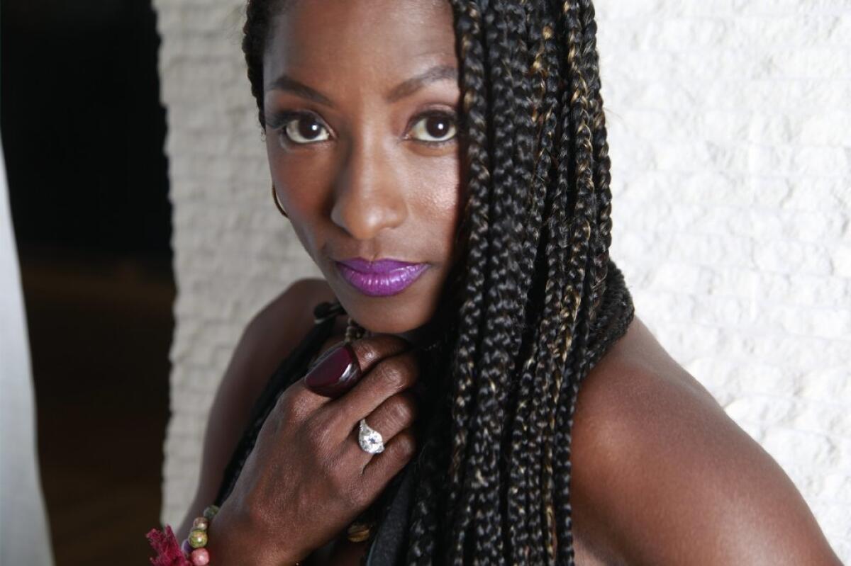 Rutina Wesley stars in the new OWN series "Queen Sugar." "She’s a beautiful mess, and I myself concede to being a beautiful mess,” Wesley says of her complicated character.