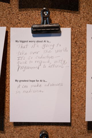 Notes written by people visiting the Exploratorium's "Adventures in AI" exhibition list their greatest worries and hopes