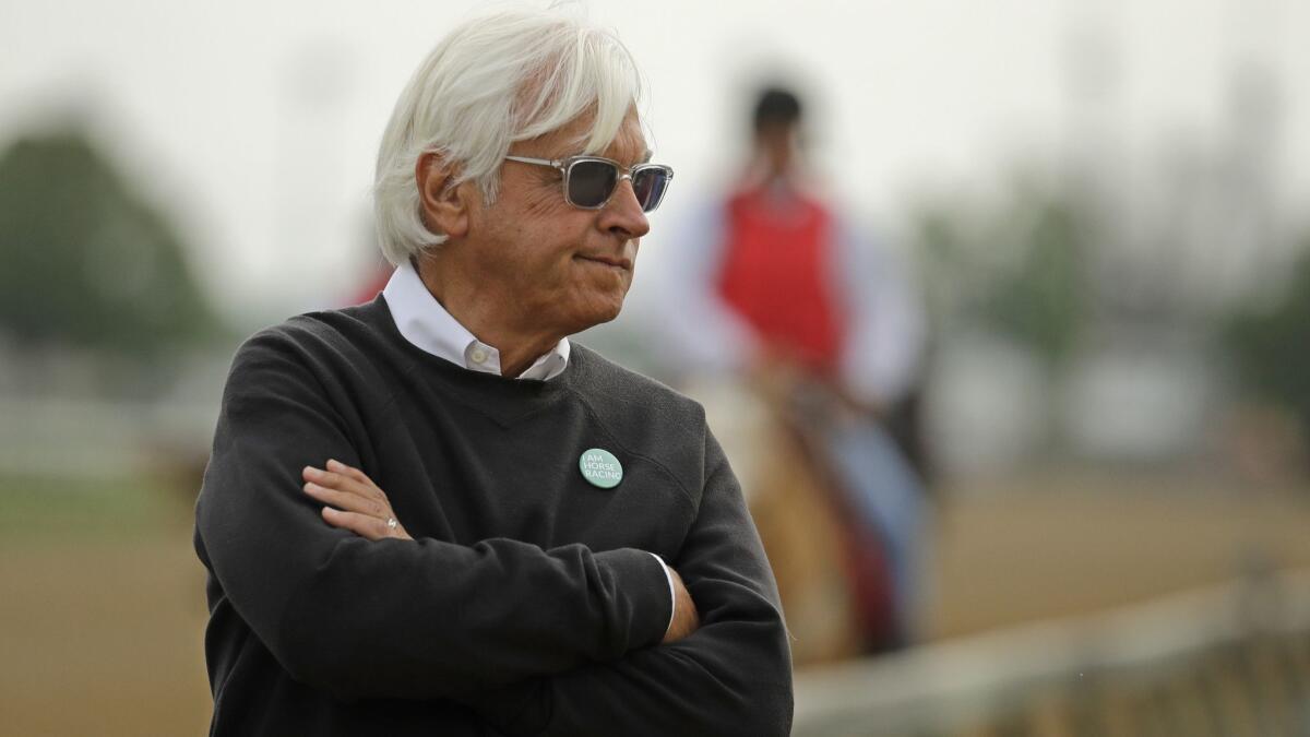 Trainer Bob Baffert watches Game Winner, one of his three Kentucky Derby horses, during a workout May 1 at Churchill Downs.