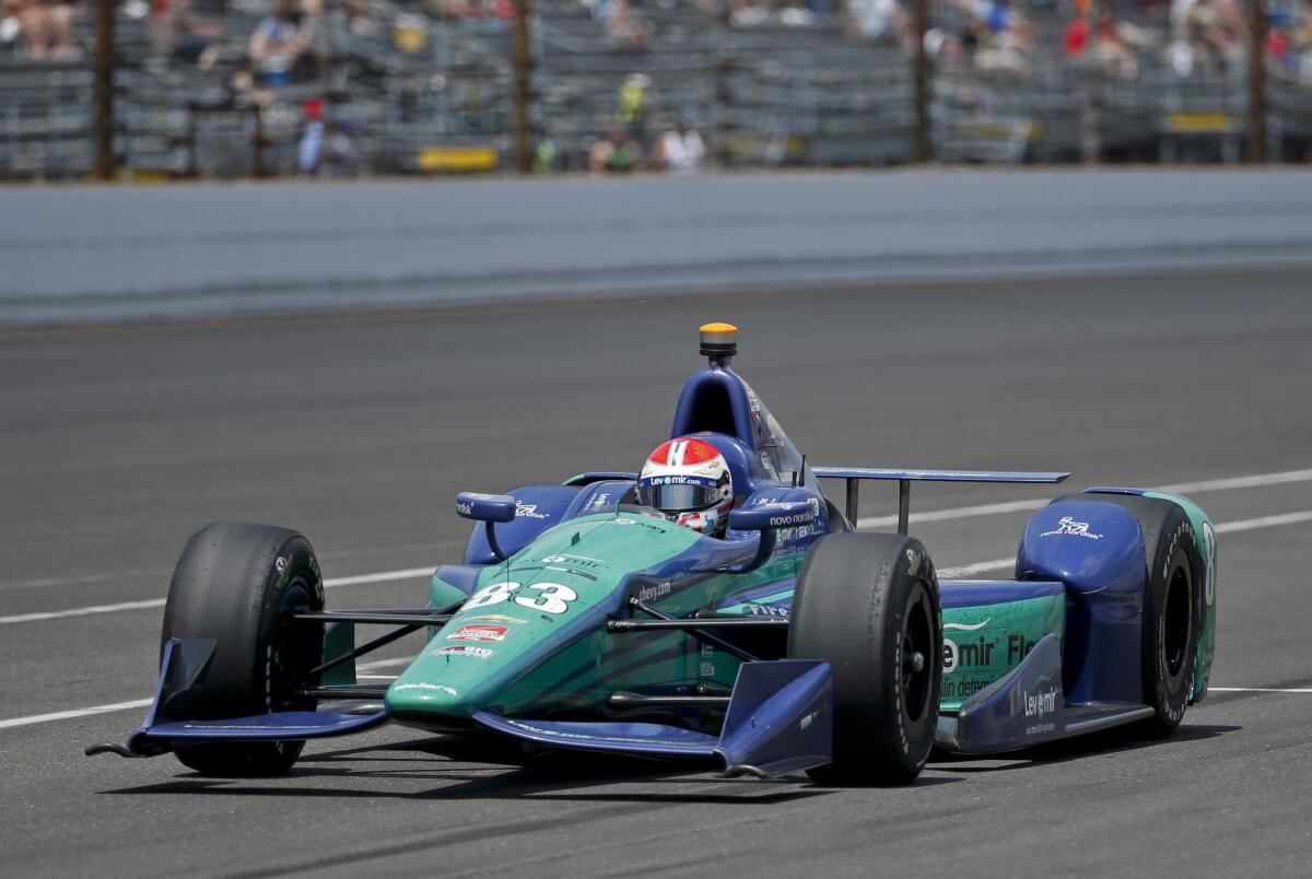 Driver Charlie Kimball pulls into the pit area during the Indianapolis 500 on Sunday at Indianapolis Motor Speedway.