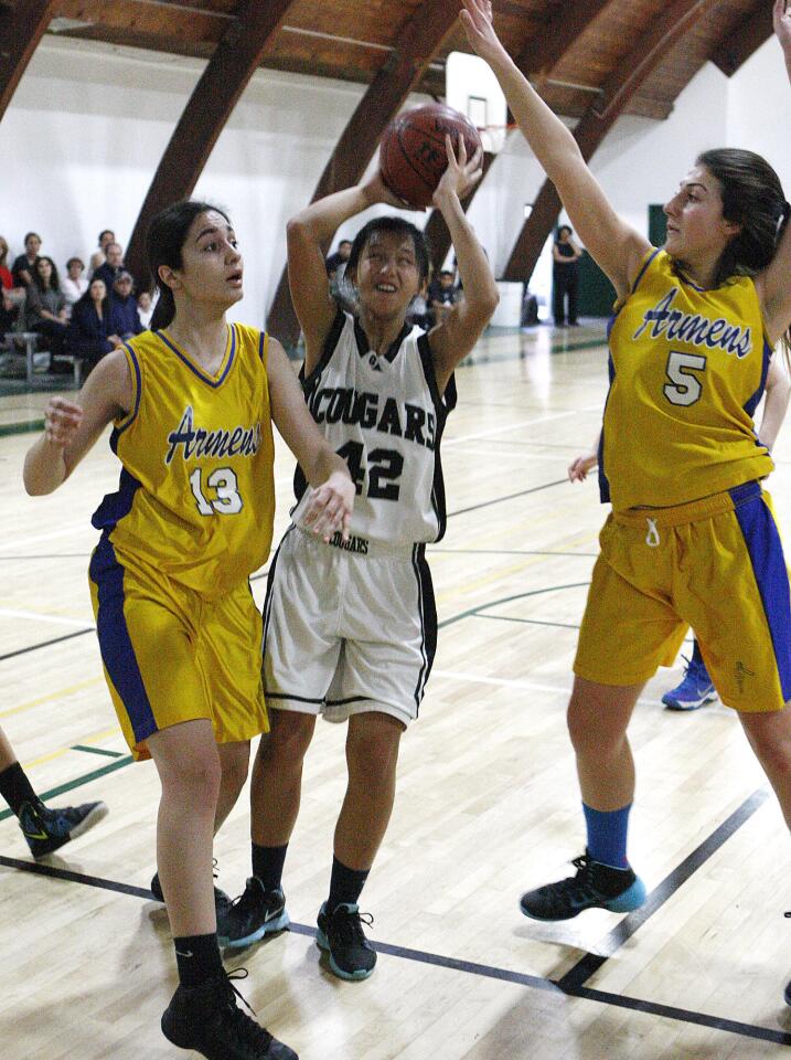 Photo Gallery: Glendale Adventist Academy vs. Holy Martyrs girls basketball