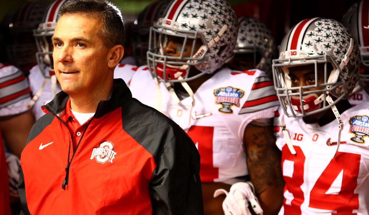 Coach Urban Meyer prepares to lead Ohio State onto the field for the College Football Playoff semifinal game against Alabama at the Sugar Bowl on New Year's Day.