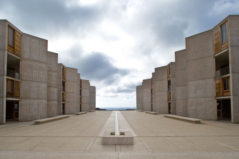 FILE - This Oct. 3, 2013 file photo shows The Salk Institute, above the Pacific Ocean in San Diego. Vicki Lundblad and Katherine Jones, a pair of top scientists at the renowned research center has sued their employer in July 2017, alleging that they and other women have suffered long-term gender discrimination. (AP Photo/Lenny Ignelzi,File)