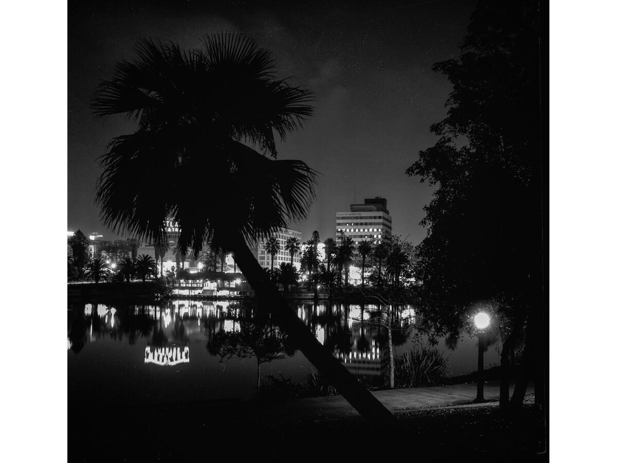 Nov. 18, 1955: Nighttime image of MacArthur Park looking across the lake toward the boathouse.