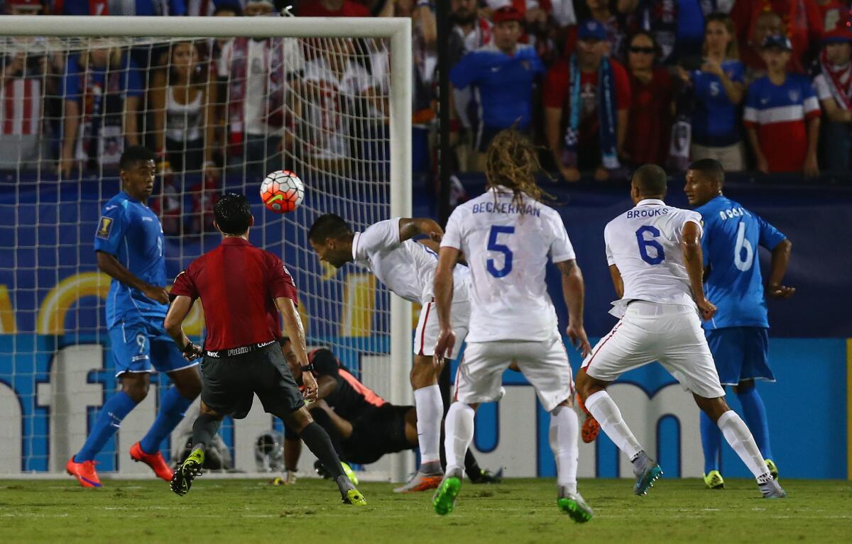 Clint Dempsey scores a goal on a header during a CONCACAF Golf Cup Group A match between the U.S. and Honduras at Toyota Stadium in Frisco, Texas.