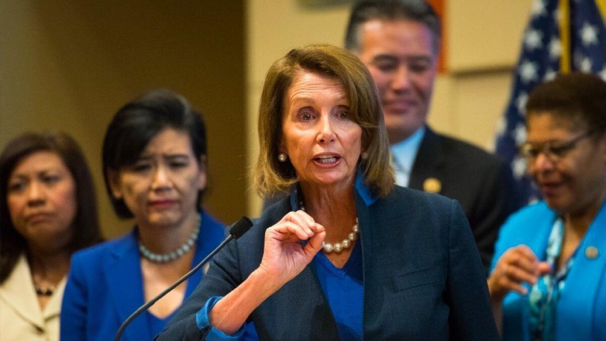 Nancy Pelosi stands with members of the Los Angeles area congressional delegation and speaks in support of protecting the Affordable Care Act at the California Endowment in downtown Los Angeles in 2017.