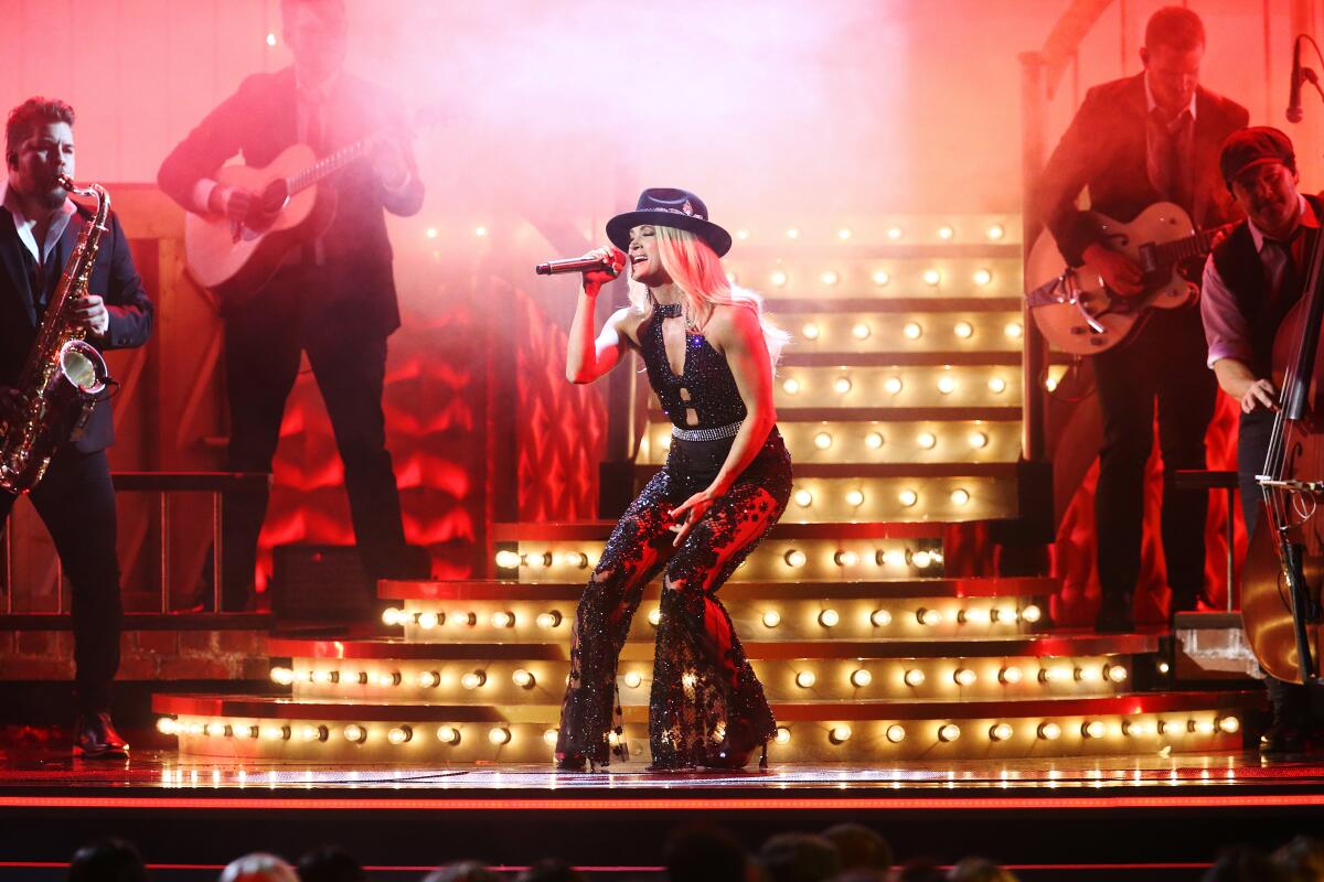 Carrie Underwood performs onstage during the 53rd annual CMA Awards