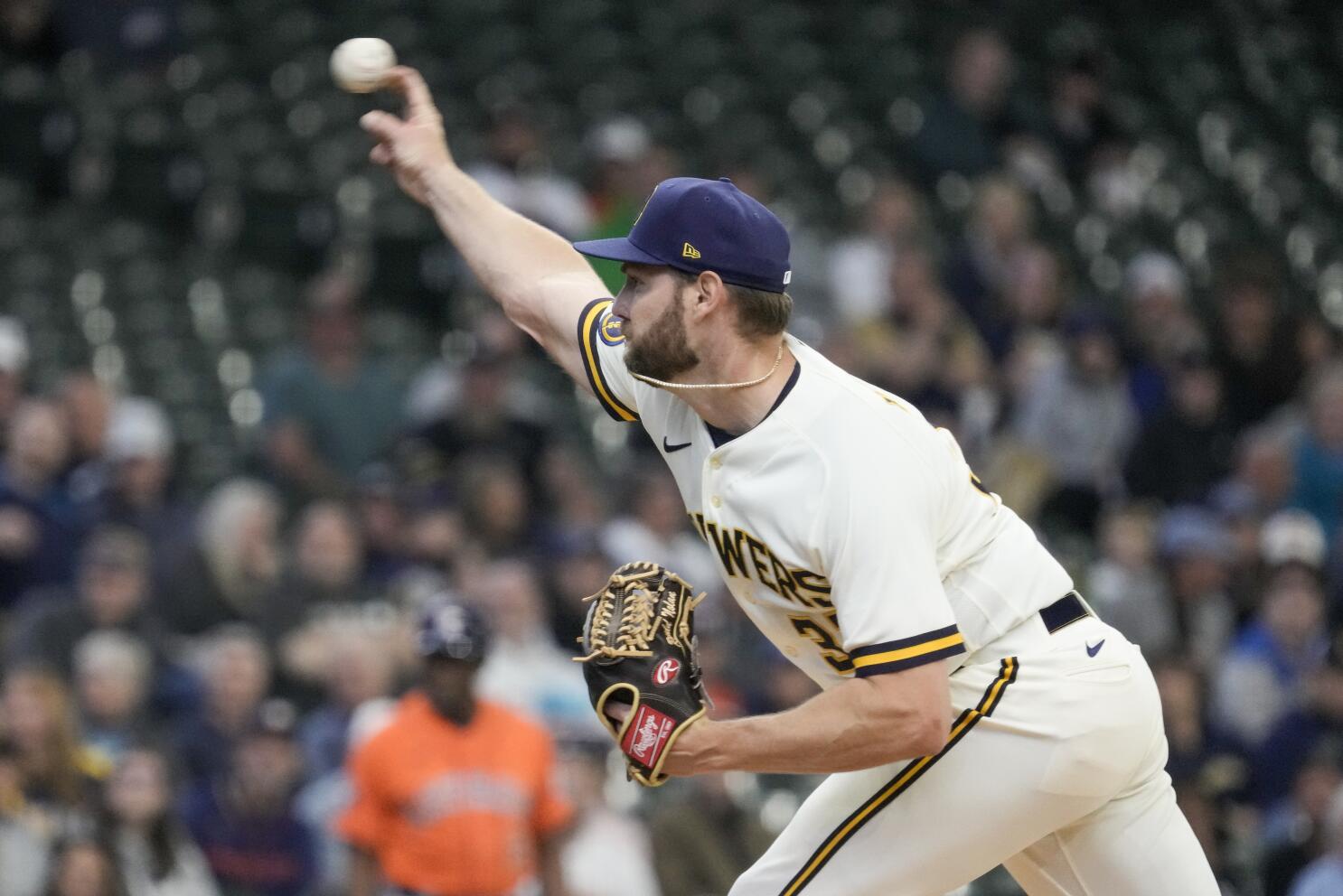 Hoby Milner of the Milwaukee Brewers throws during a baseball game