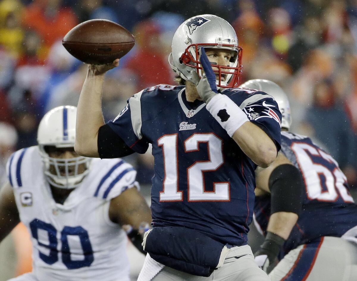 New England Patriots quarterback Tom Brady looks to pass during the AFC championship game against the Indianapolis Colts on Jan. 18.