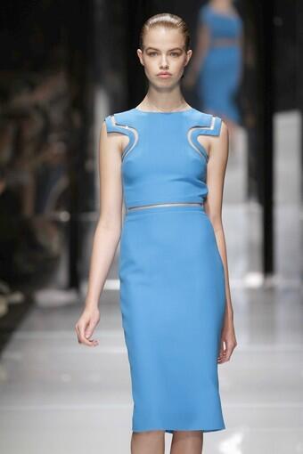 Versace's palette was bold (bright white, azure blue, red and black), and the silhouette slim.