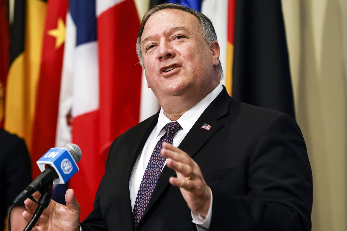 Secretary of State Michael R. Pompeo speaks to reporters from a lectern at the United Nations