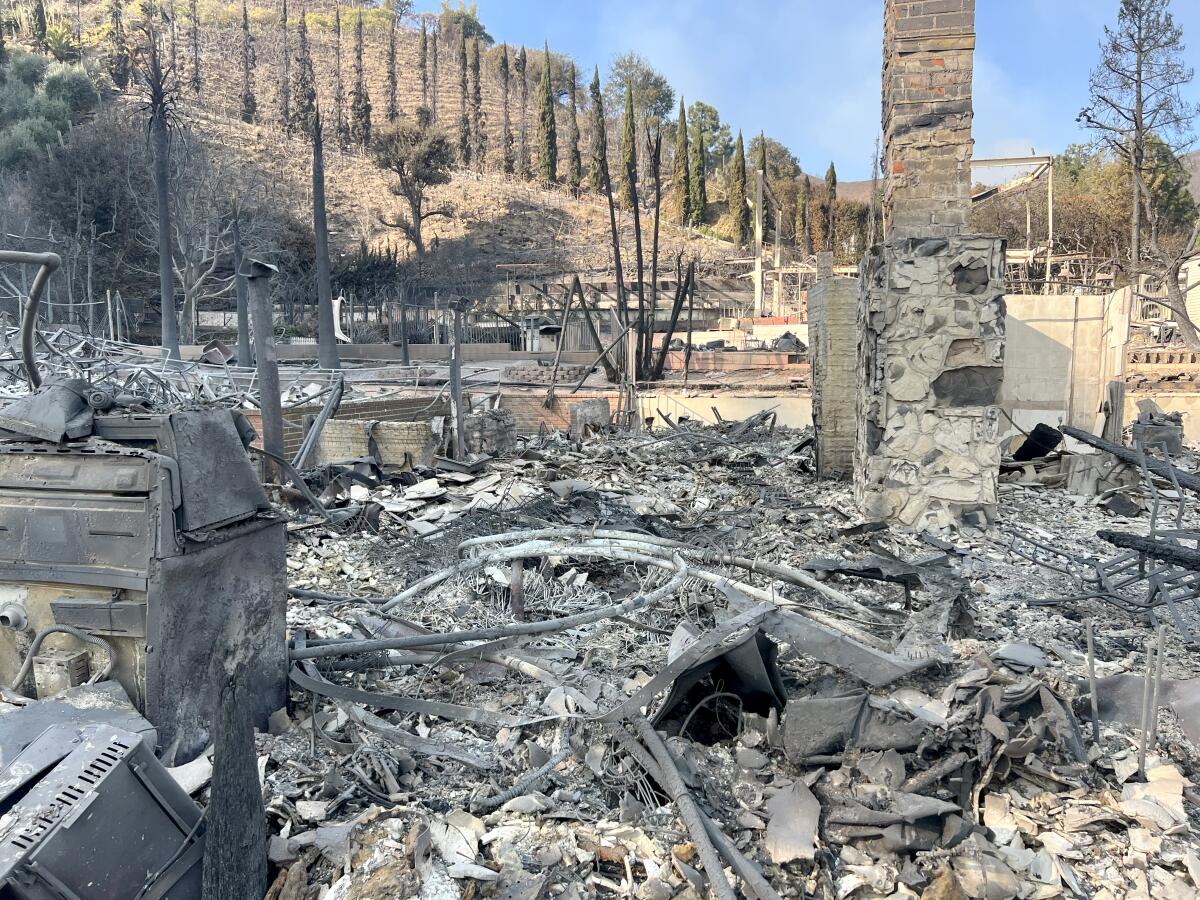 The smoldering remains of Larry Schoenberg's Pacific Palisades house.