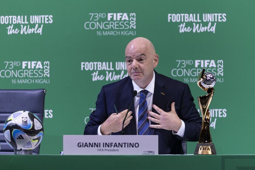 FIFA president Gianni Infantino speaks during a press conference at the 73rd FIFA Congress, held in Kigali, Rwanda Thursday, March 16, 2023. Infantino was re-elected by acclaim to another four-year term on Thursday after suggesting the financial results under his leadership would keep an industry CEO in the job for life. (AP Photo)