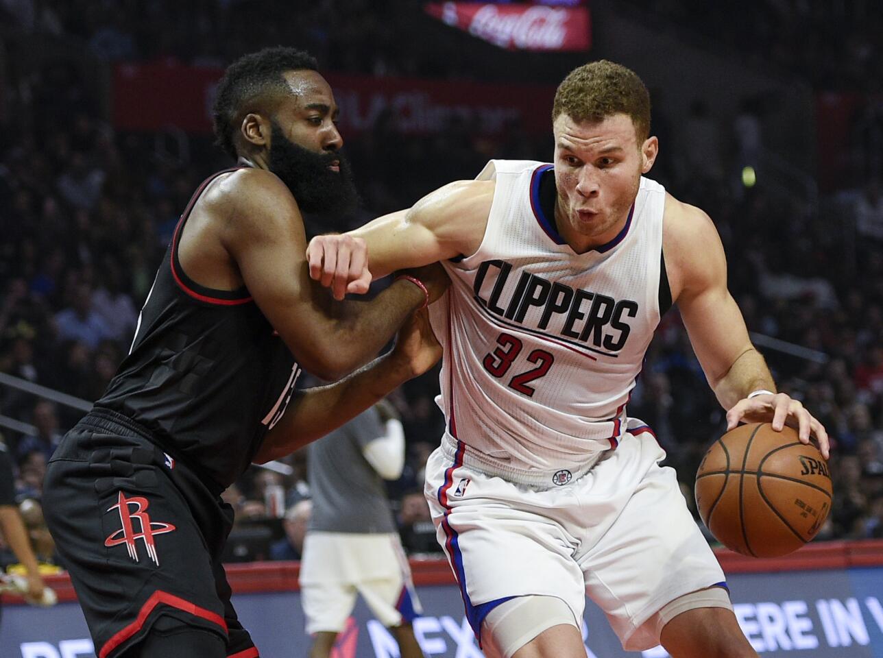 Clippers forward Blake Griffin drives against Rockets guard James Harden during the first half.