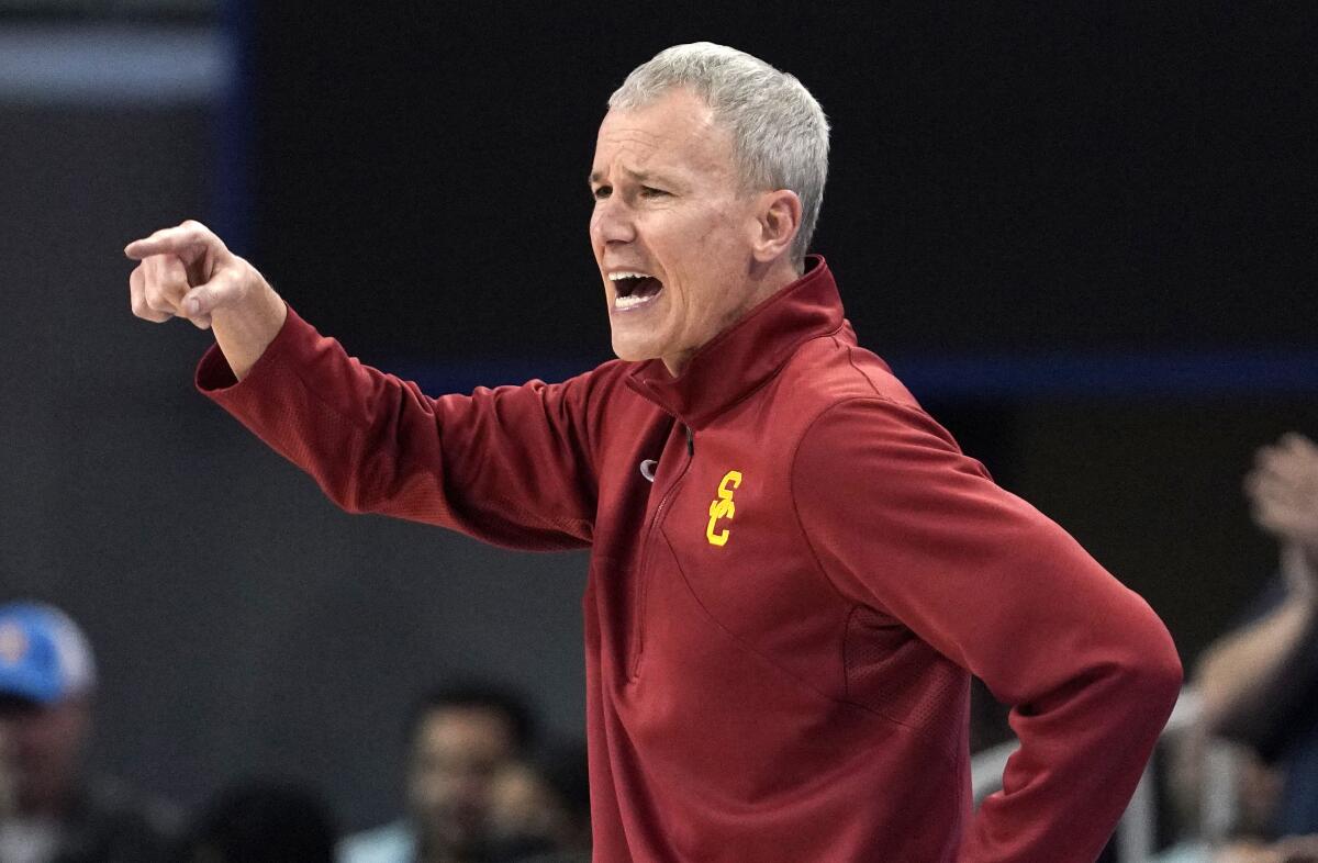 USC coach Andy Enfield shouts and points during a game against UCLA in March.