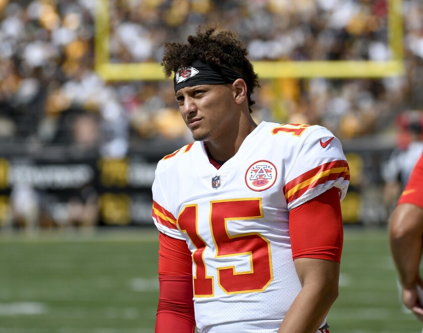 Kansas City quarterback Patrick Mahomes watches from the sideline as the Chiefs defense plays last season. 